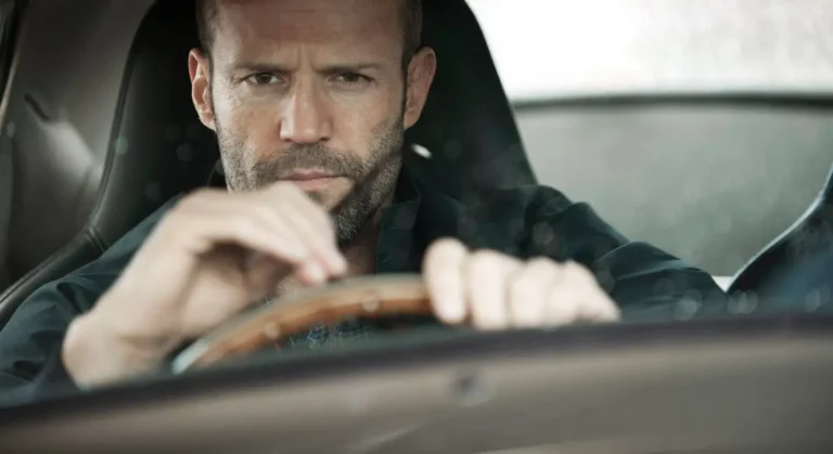 Jason Statham driving